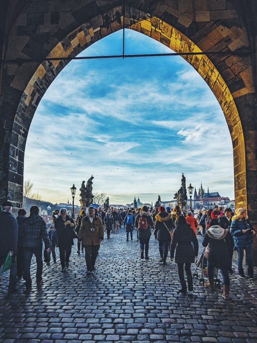 walking the charles bridge in prague