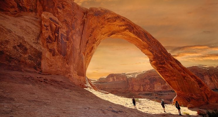 the sandstone corona arch near moab during golden hour