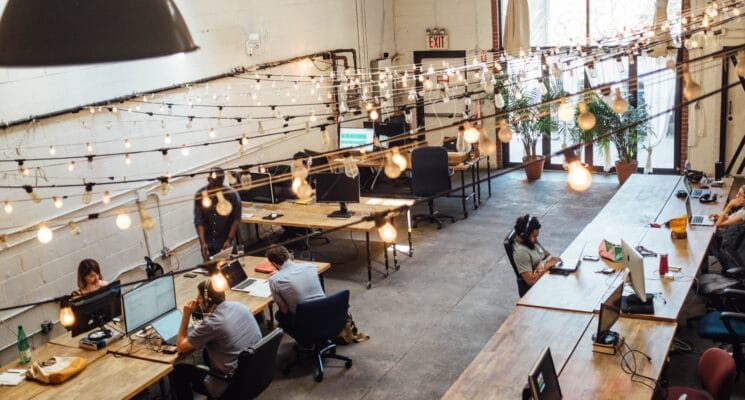 people coworking at desks in prague