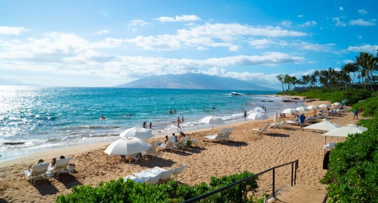 people on the beach in maui, hawaii -things to do maui beach