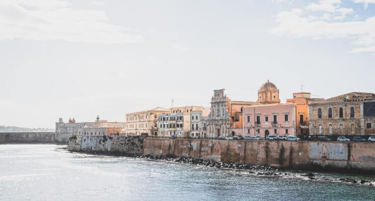 Buildings along the coast of Ortigia, Sicily, right before sunset.